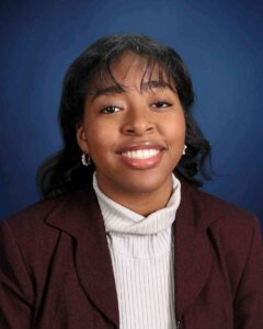 Headshot of Black woman named Trinity